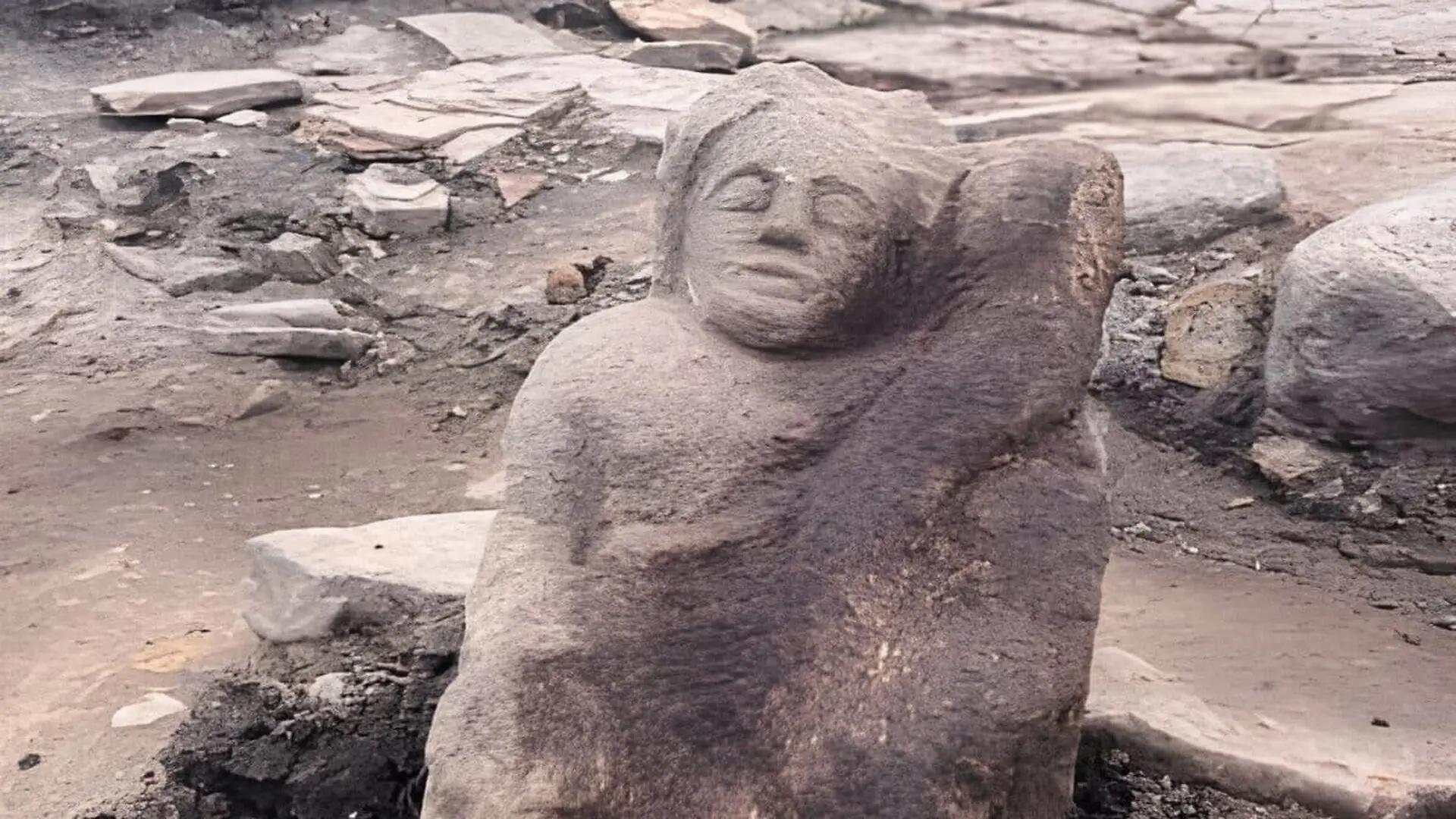 Carved Stone Depicting A Genius In Situ Scaled