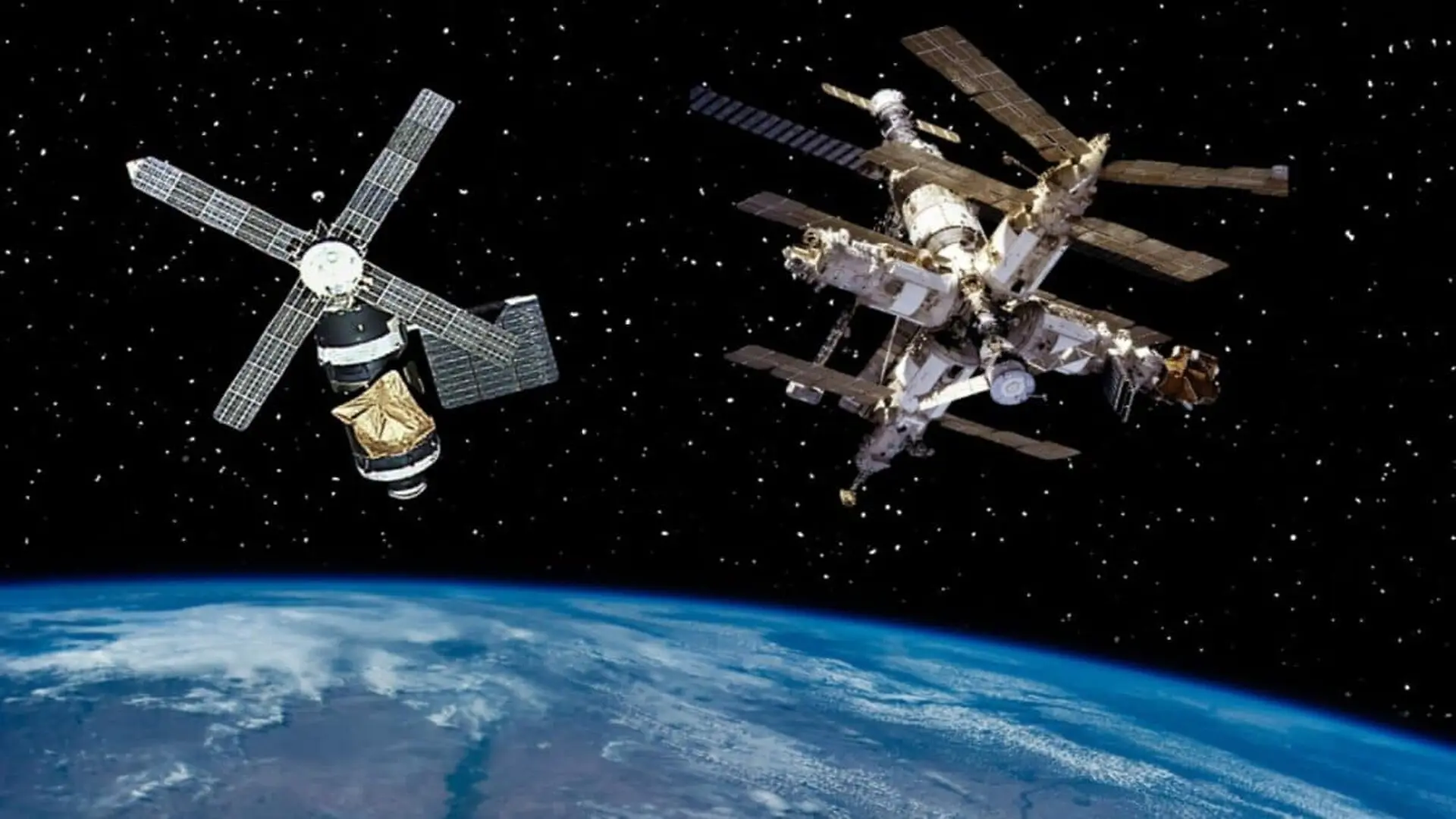 Two Space Stations Above The Earth Scaled
