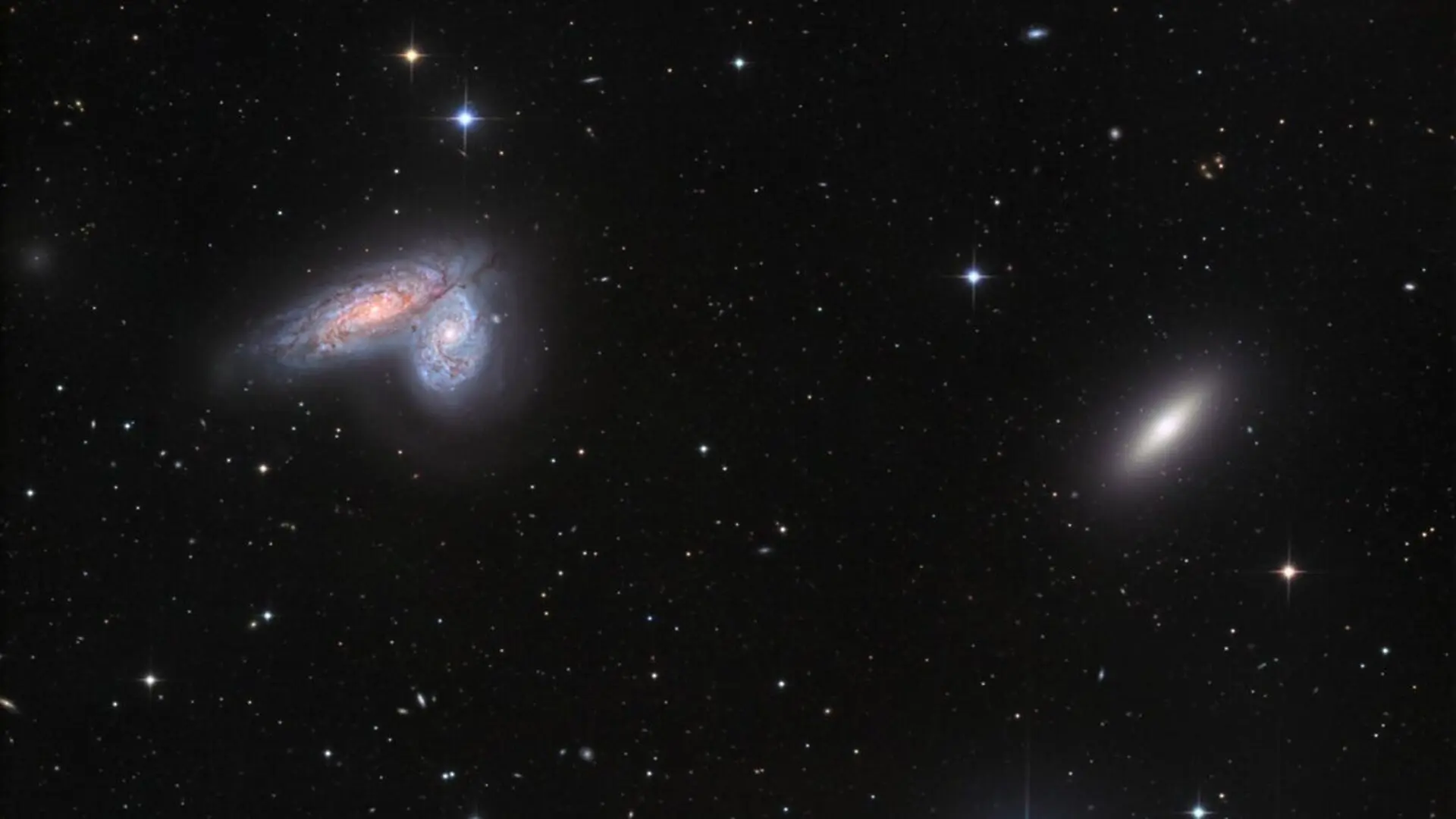 Scientists Watched A Star Explode Inside Two Galaxies That Are Slowly Merging Together Scaled