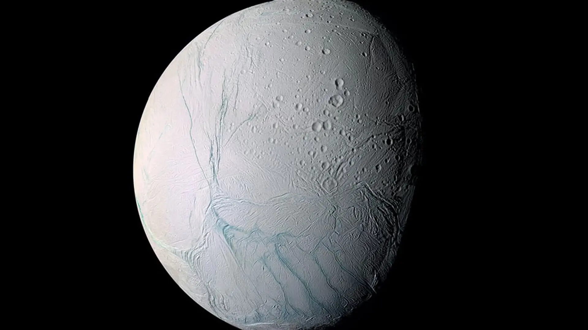 Enceladus looks white and has blue streaks across it.