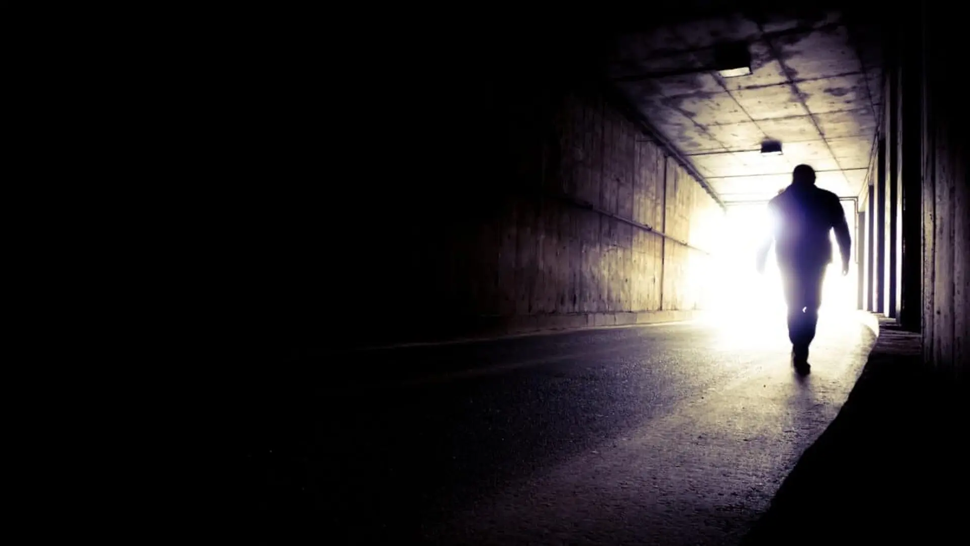 A Man Going To The End Of A Tunnel To The Light Scaled
