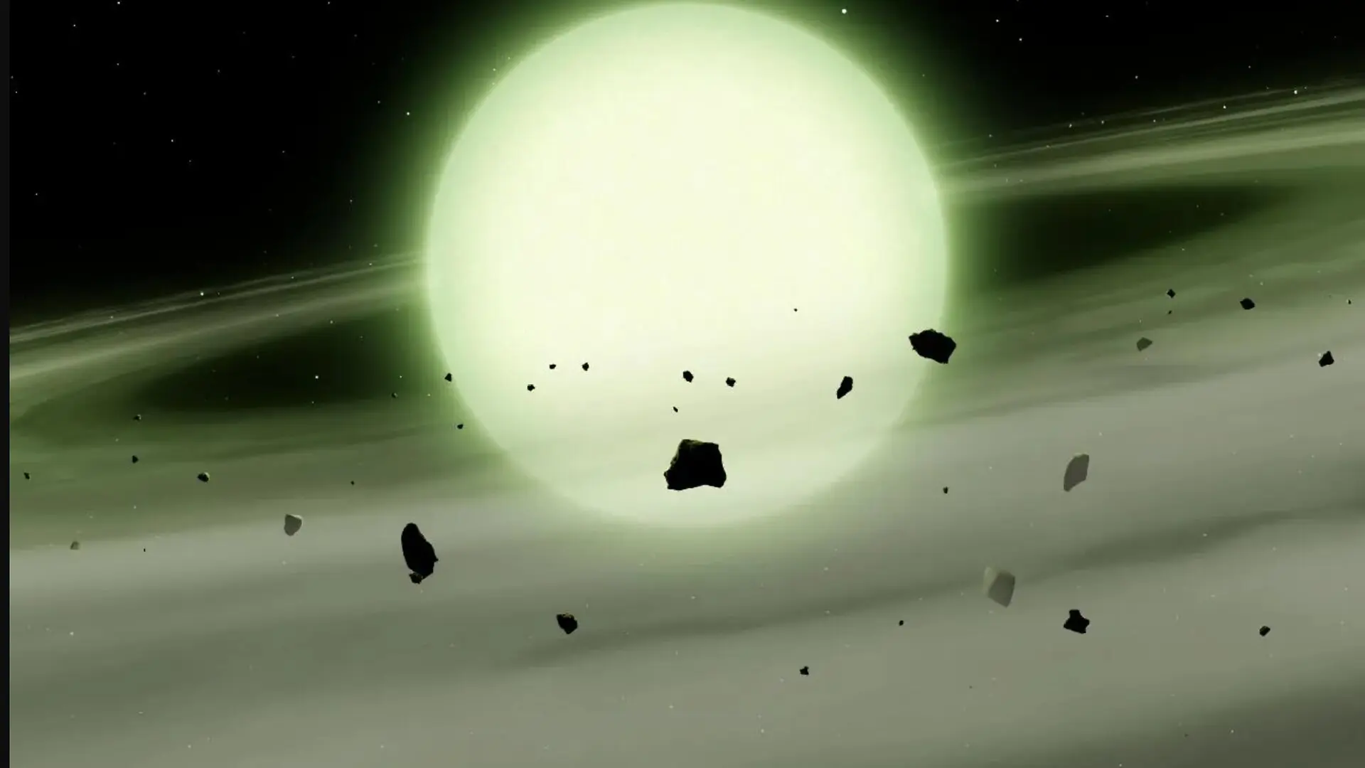 The cool white dwarf WDJ1330+6435 has accreted sodium-rich rocky material from its planetary system into its atmosphere. The immense atmospheric density causes the sodium to absorb light over broad range of yellow, orange, and red wavelengths, giving the WDJ1330+6435 a ghostly green appearance. (CREDIT: Mark A. Garlick/University of Warwick)