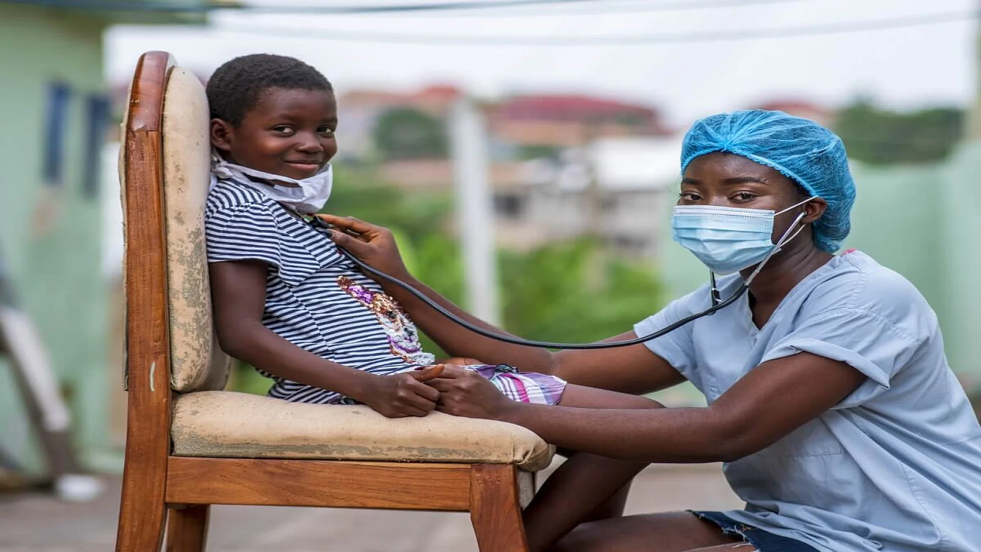 Closeup shot of a boy getting a checkup by a doctor.