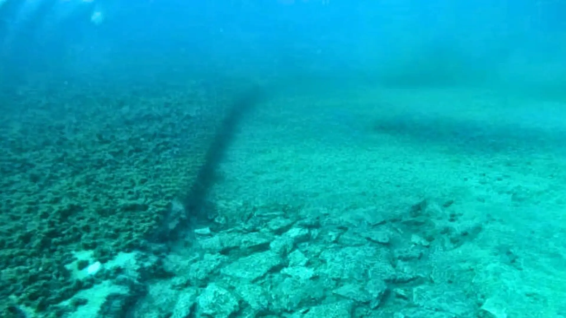 A Stone Road Reveals An Ancient Engineered Island Community Below Scaled