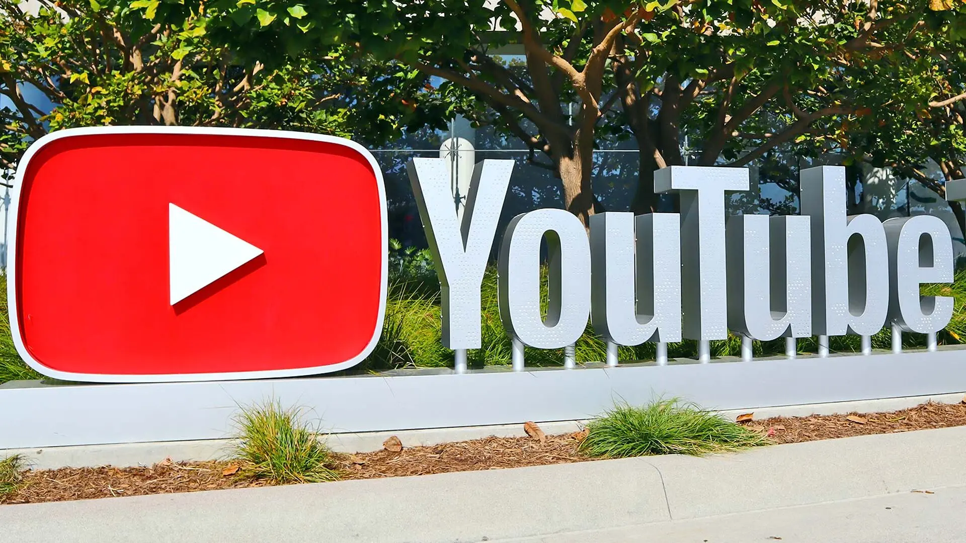 A sign outside the YouTube theater reads 