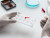 Close-up of a gloved hand holding a pipette