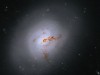 Hubble Captures Rare Galaxy Caught in Dramatic Evolutionary Shift Across Cosmic Time